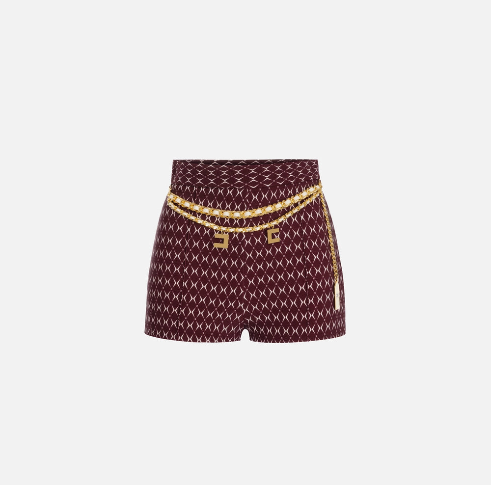 Shorts aus Stretch-Crêpe mit Rauten-Print und Kette.