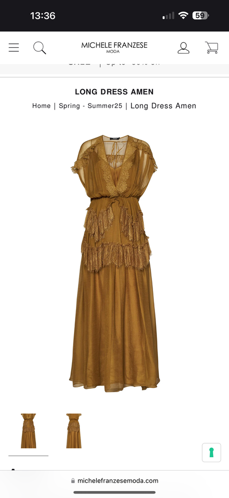 Long amber dress in silk georgette with lace inserts and flounced skirt.